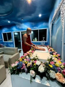 A pet farewell ceremony decorated with flowers and candles by Peaceful Paws